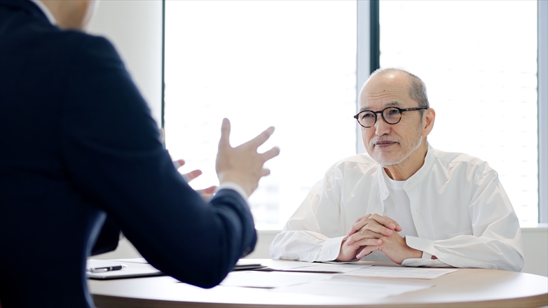 elderly people receiving sales from businessmen